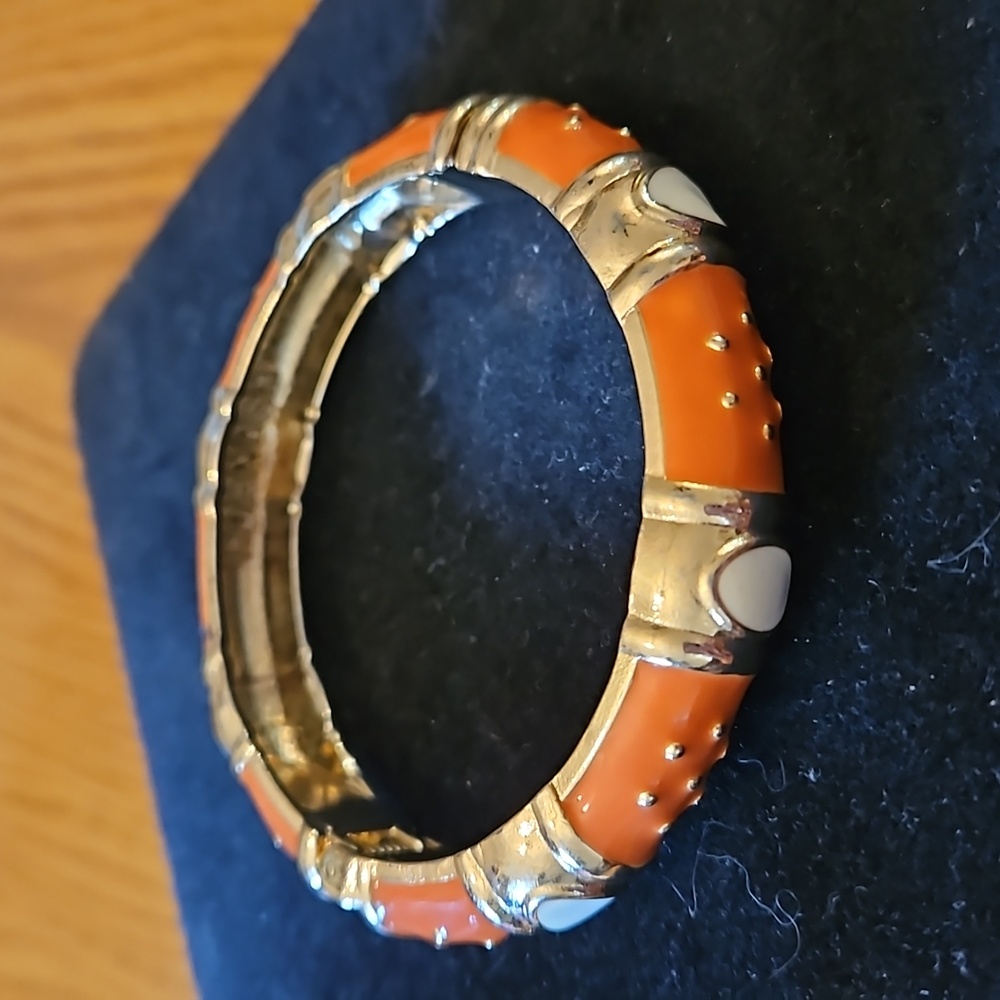 Orange and white enamel bracelet by Fornash